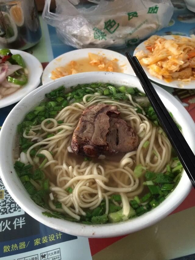 ţ